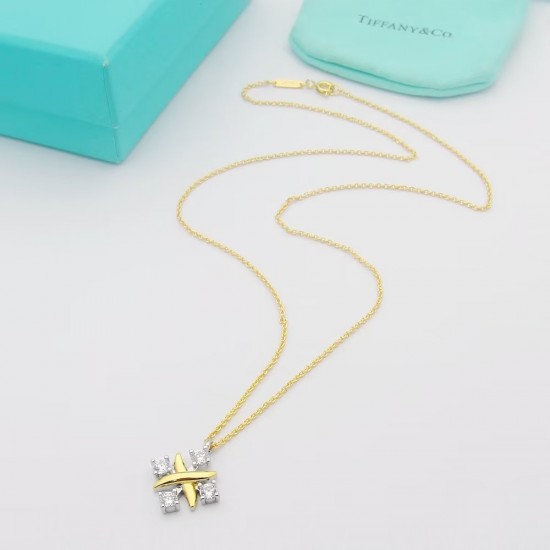 Tiffany Schlumberger Cross Four Diamond Necklace