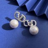 Valentino Pearl Letter Earrings