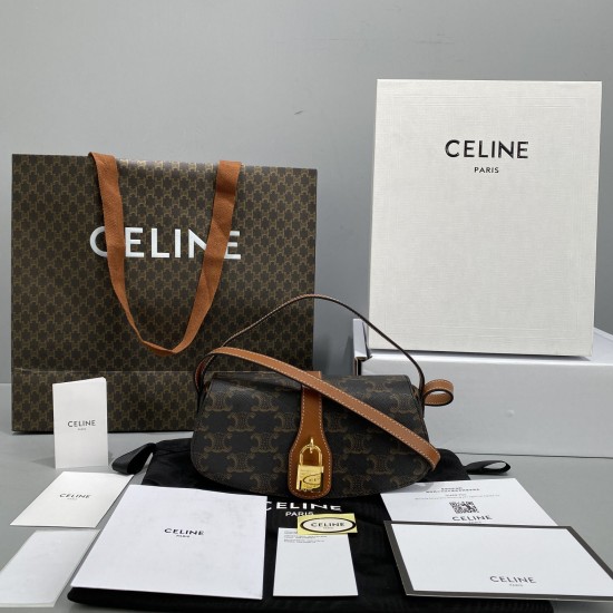 CELINE CLUTCH ON STRAP TABOU IN TRIOMPHE CANVAS AND CALFSKIN